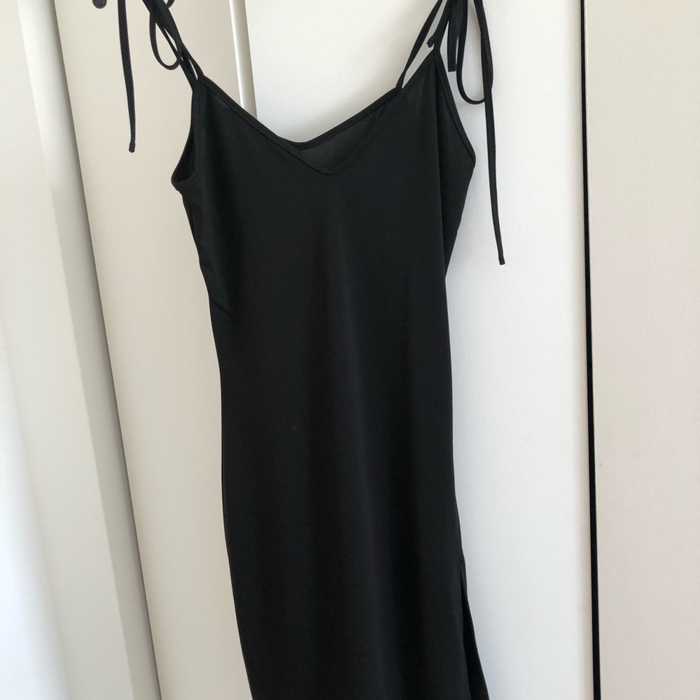 NWOT black midi dress with side slit
